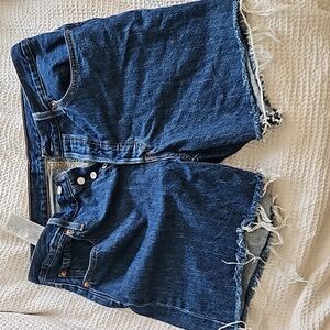 Cue Levi's button fly cutoffs perfect for everything this summer and fall. New.